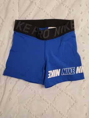 Nike Blue Compression Shorts with Black Waistband and White Logo